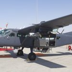 UAE military Cessna Caravan surveillance aircraft with sensor and weapon bay open, displayed at airshow